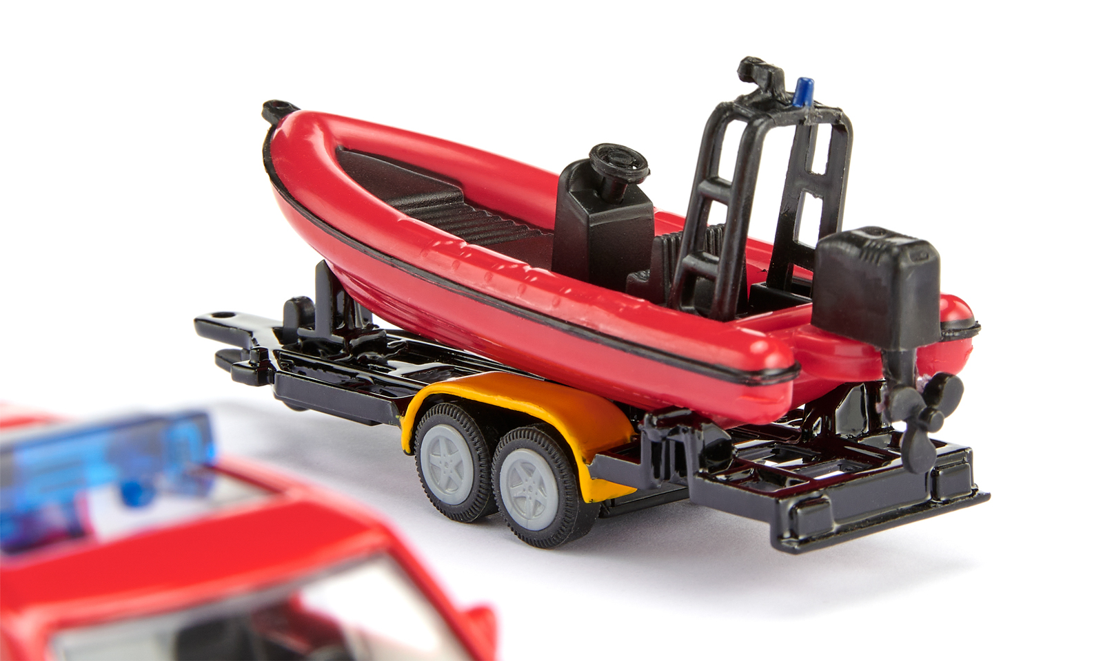 SIKU Blister - Land Rover se člunem