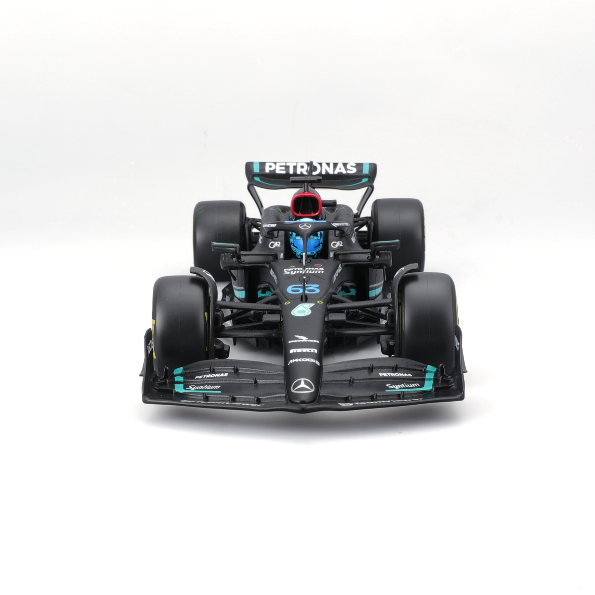 Bburago - RACE F1 v dekorativním boxu, Mercedes-AMG Petronas W14 E (2023), #63 George Russell, 1:24